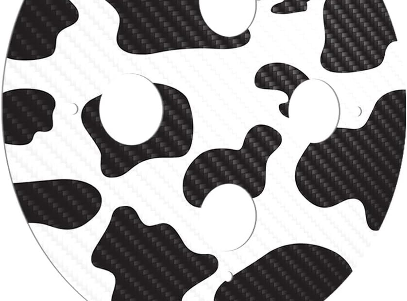 Transform Your Echo Dot with MightySkins: The Ultimate Cow Print Carbon Fiber Skin!